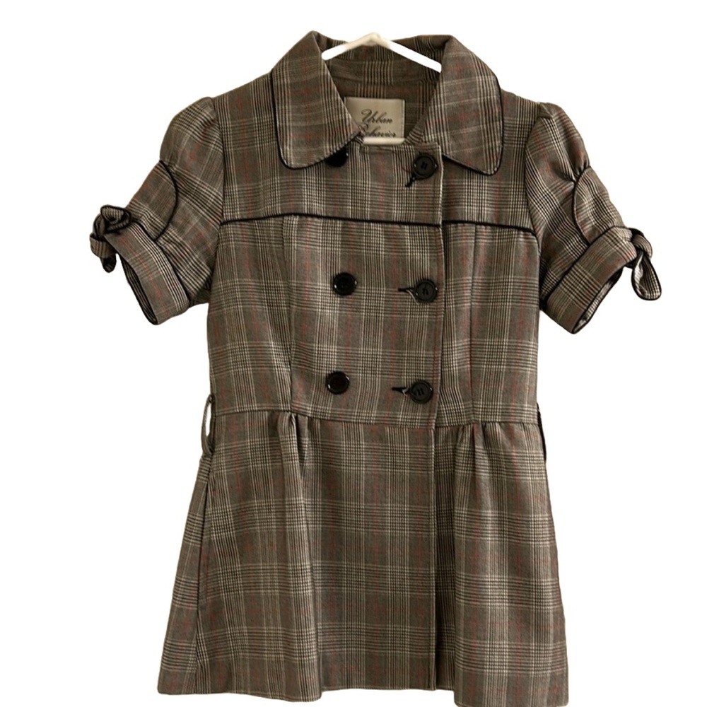Women’s plaid jacket with cute sleeve details and  double breasted buttons.